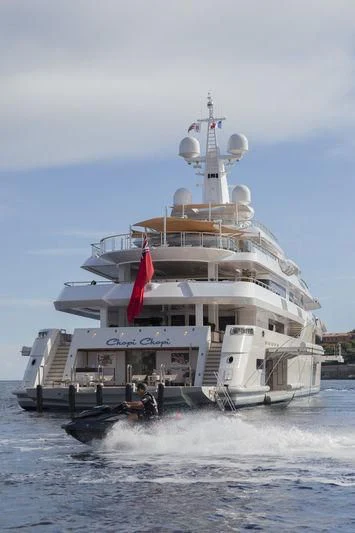 a large white ship with flags on it aboard CHOPI CHOPI Yacht for Sale