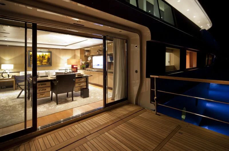 a room with a desk and a tv aboard CHOPI CHOPI Yacht for Sale
