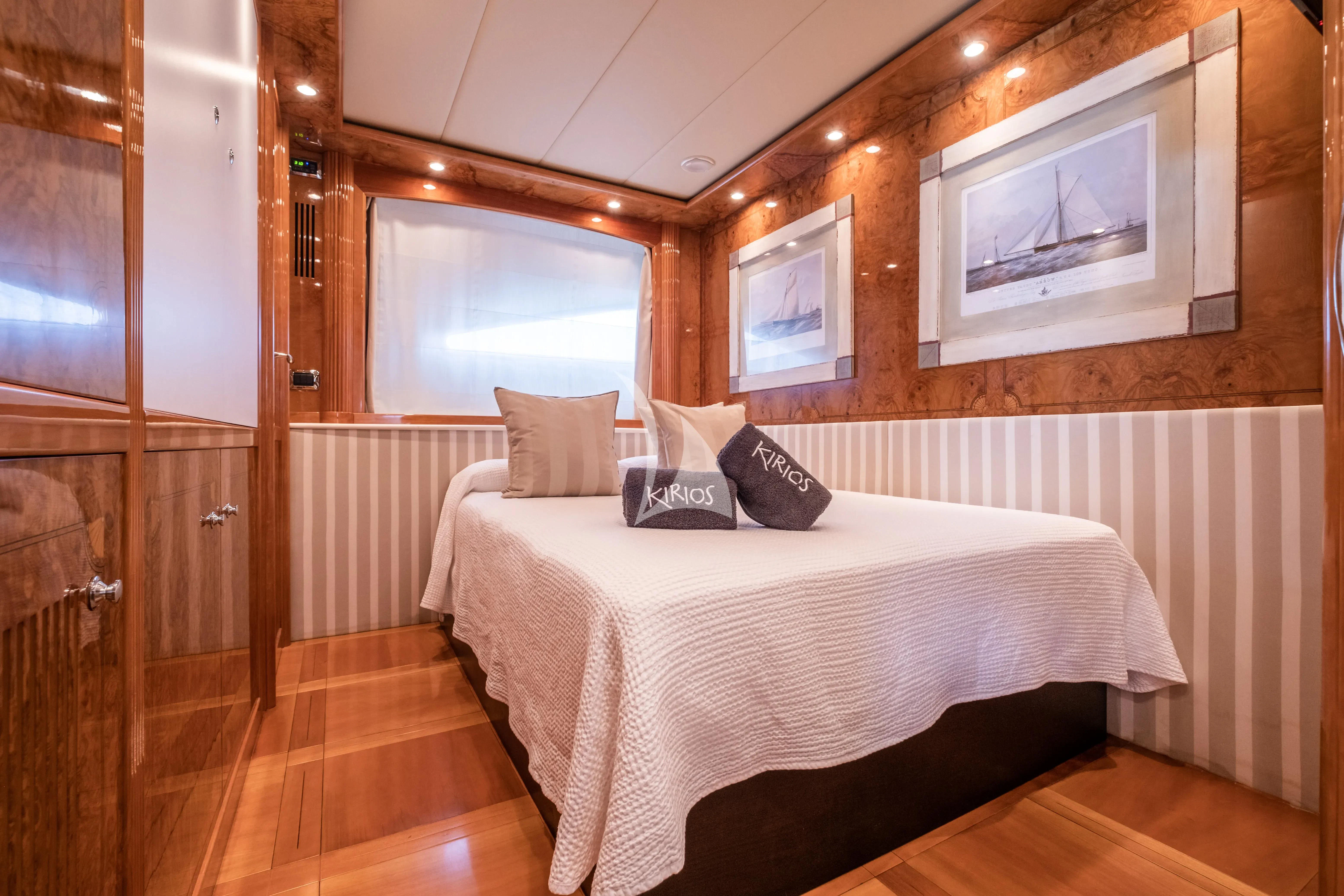 a bed in a room aboard KIRIOS Yacht for Sale