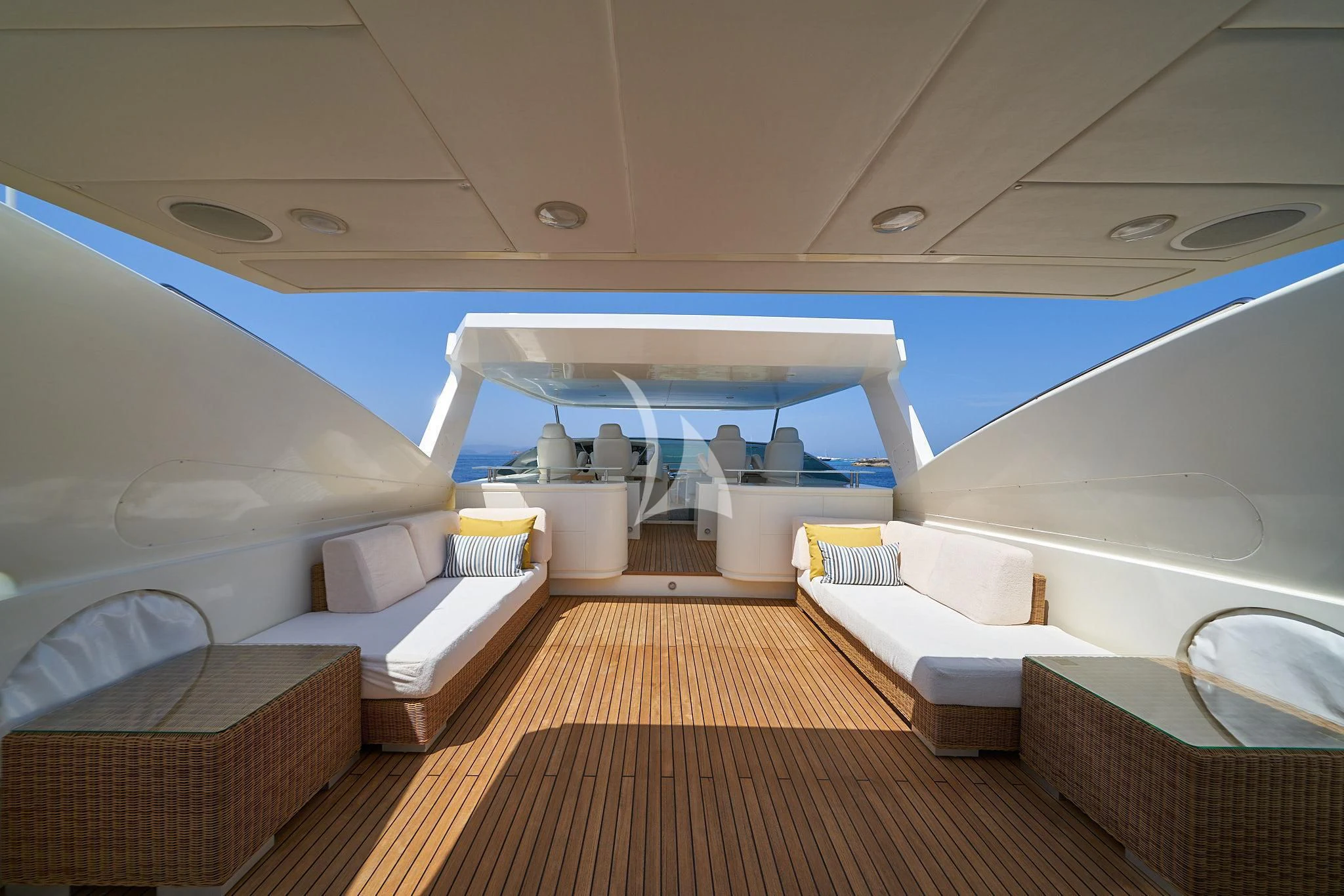 a boat with a wooden deck aboard KIRIOS Yacht for Sale