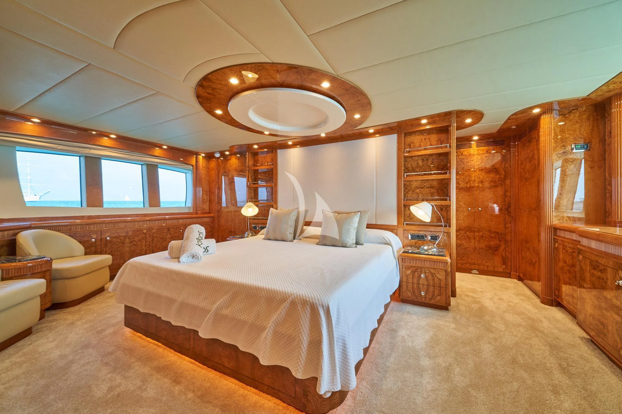 a bedroom with a large bed aboard KIRIOS Yacht for Sale