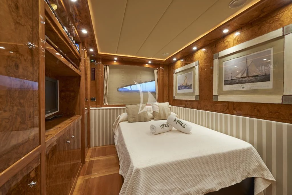 a bed in a room aboard KIRIOS Yacht for Sale