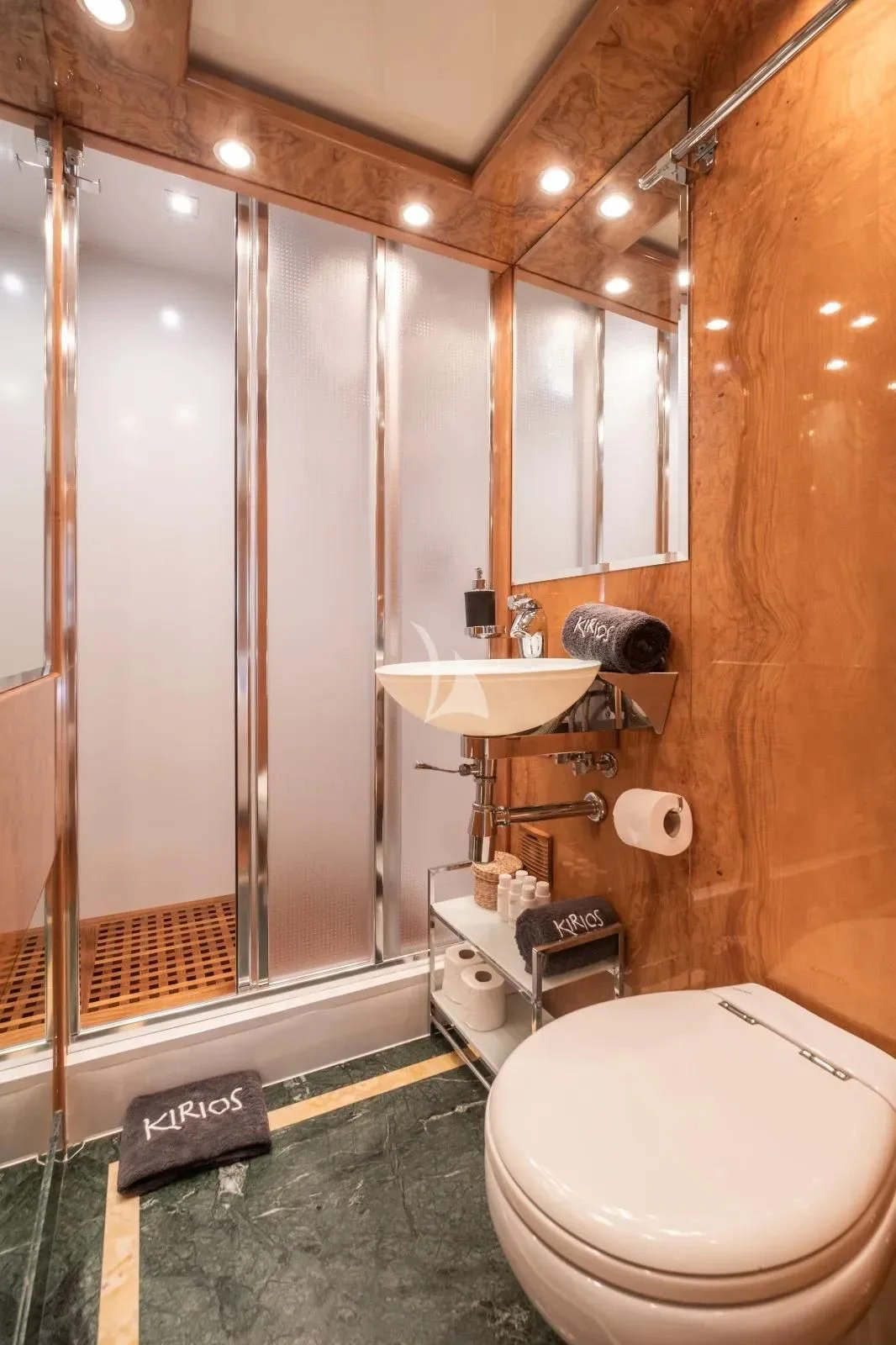 a bathroom with a glass shower aboard KIRIOS Yacht for Sale