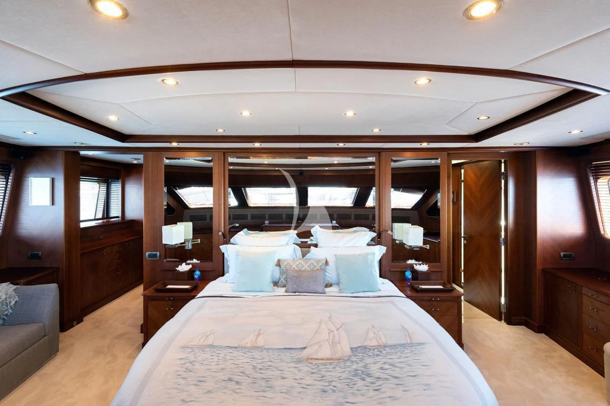 a bed in a room aboard SEA BLUEZ Yacht for Charter