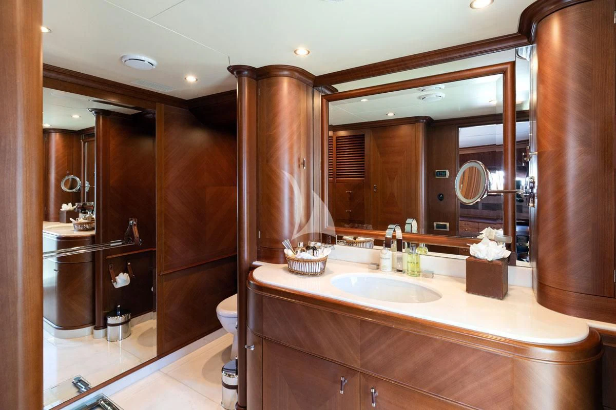 a bathroom with a large mirror aboard SEA BLUEZ Yacht for Charter