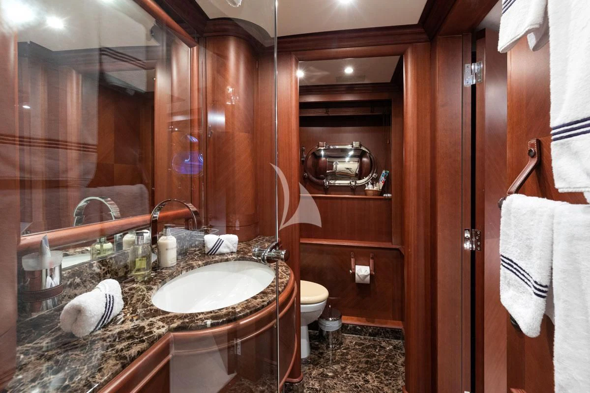 a bathroom with a large mirror aboard SEA BLUEZ Yacht for Charter