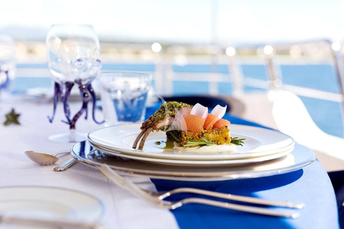 a plate of food on a table aboard SEA BLUEZ Yacht for Charter