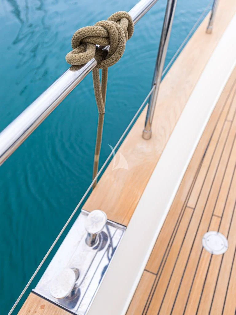 a wooden boat with ropes aboard PASSION Yacht for Sale