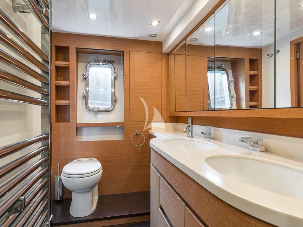 a bathroom with a sink and a toilet aboard PASSION Yacht for Sale