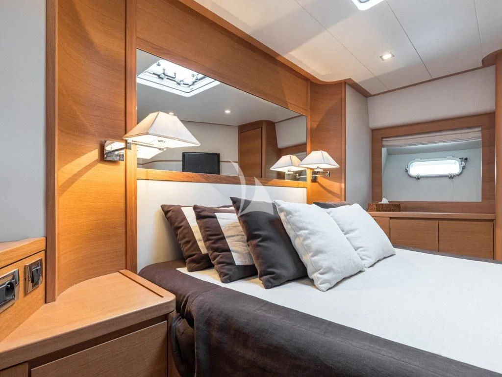 a bed in a room aboard PASSION Yacht for Sale
