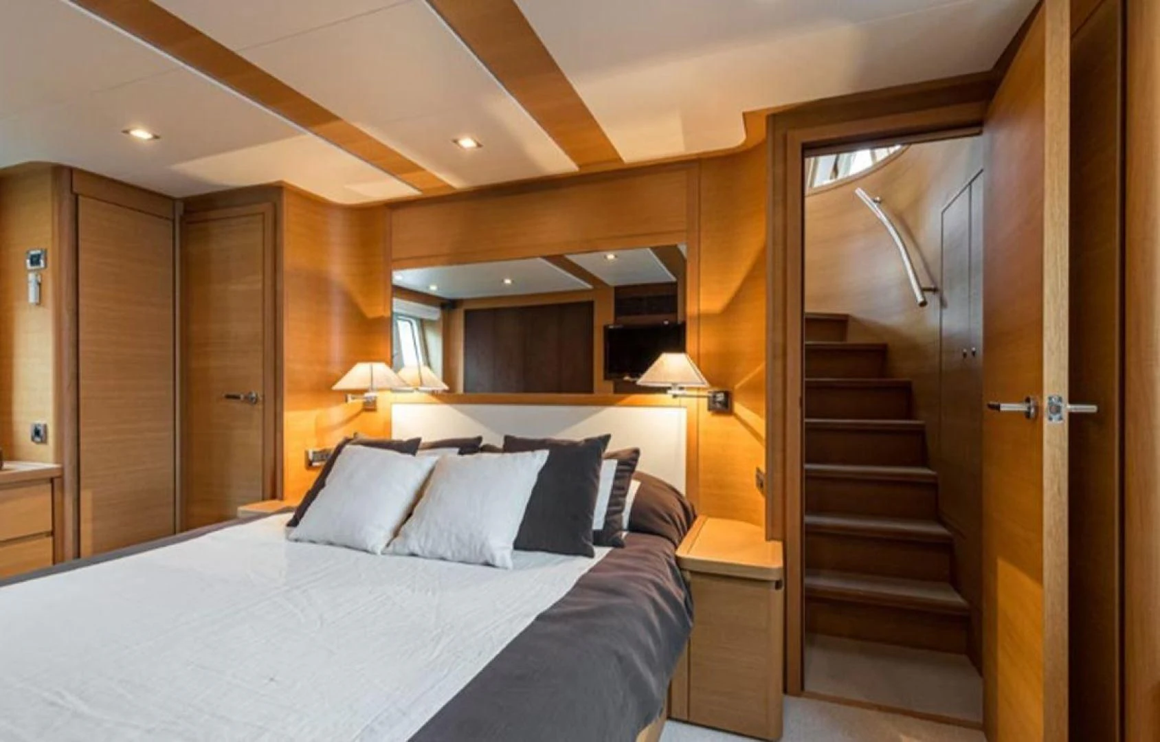 a bed in a hotel room aboard PASSION Yacht for Sale