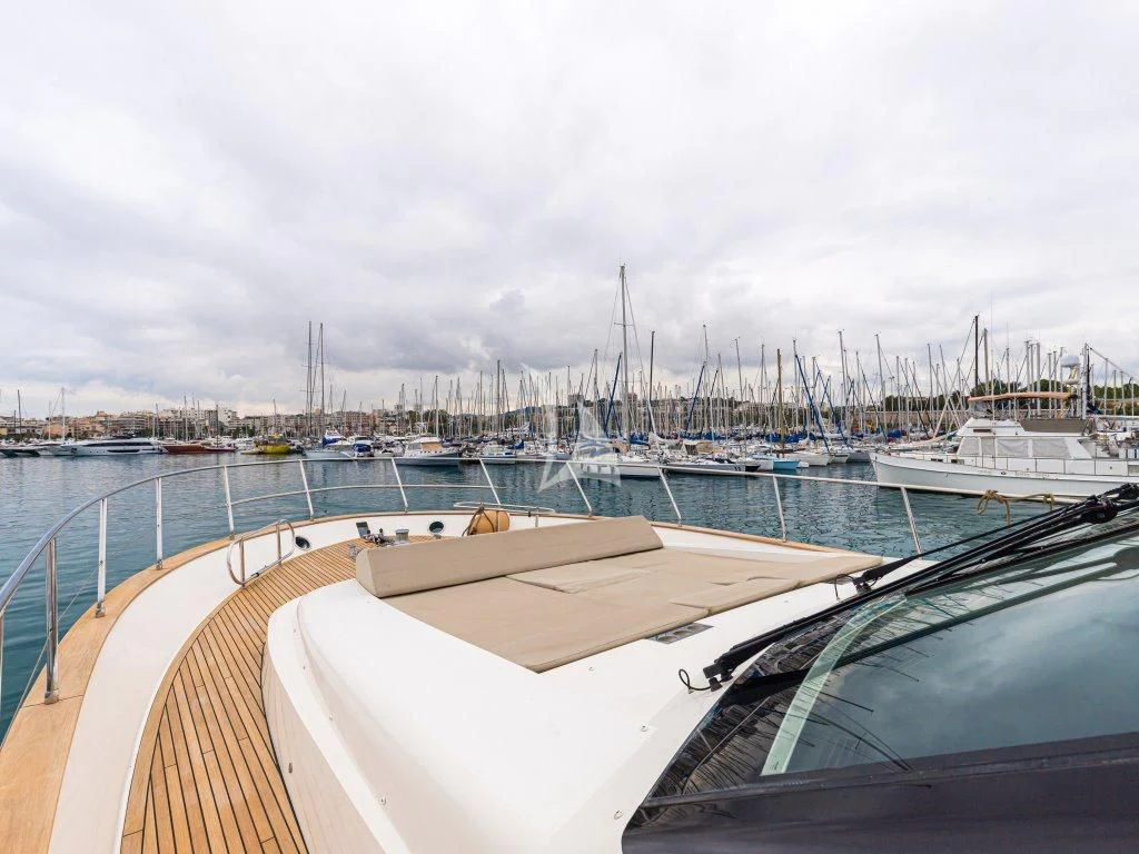 a boat in a harbor aboard PASSION Yacht for Sale