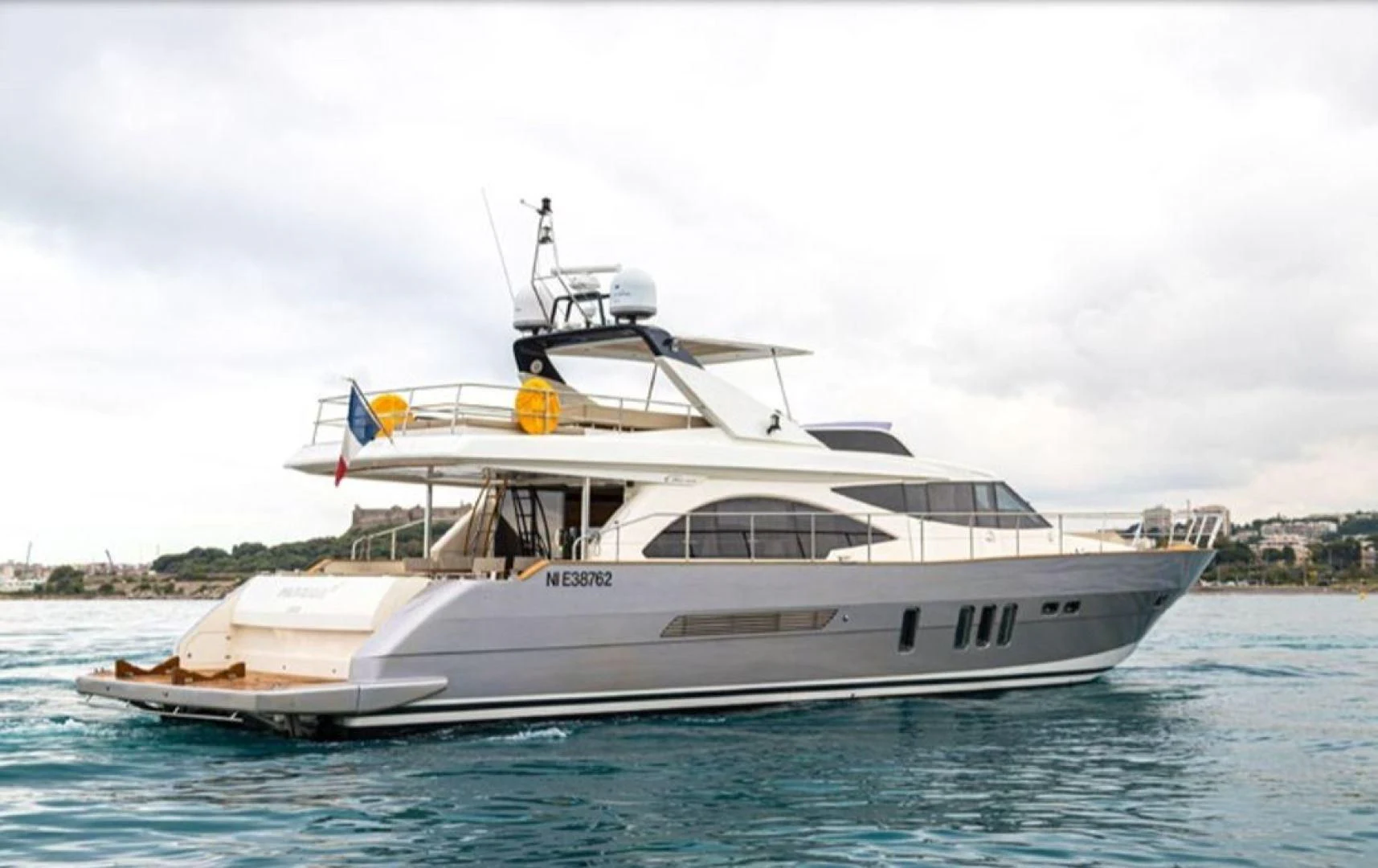 a white yacht on the water aboard PASSION Yacht for Sale