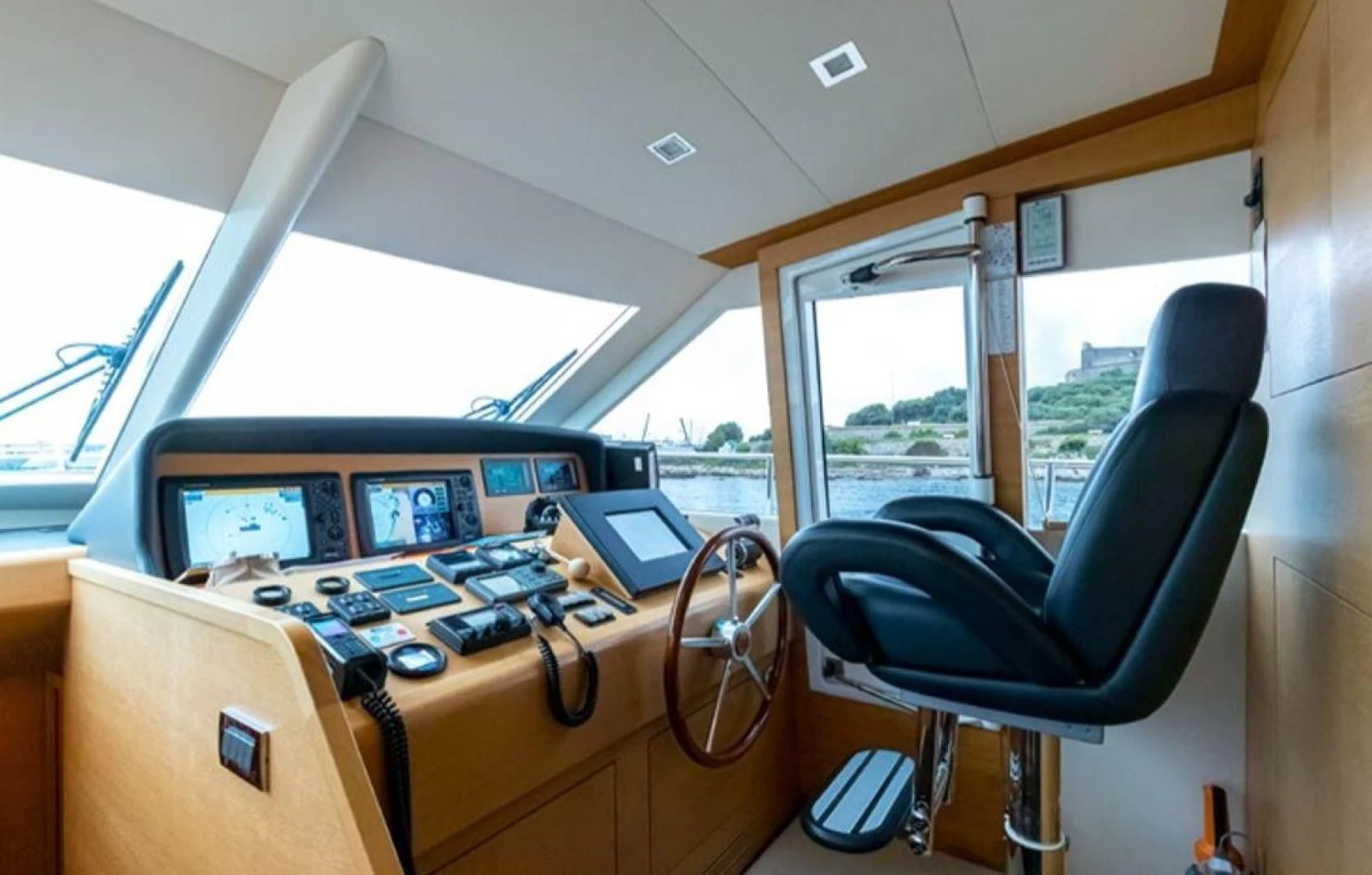 a vehicle with a desk and computer aboard PASSION Yacht for Sale