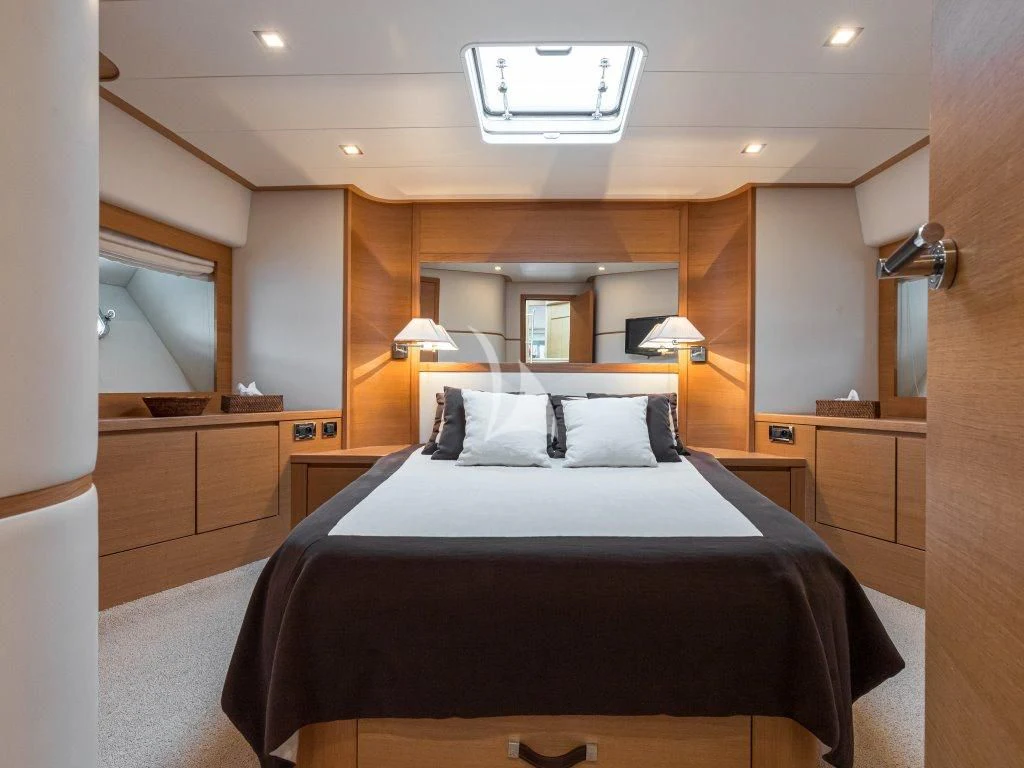 a bed in a room aboard PASSION Yacht for Sale