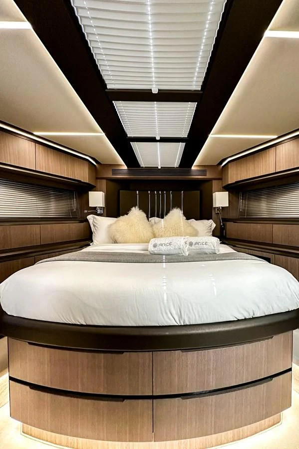 a bed with a canopy over it aboard JANICE Yacht for Sale