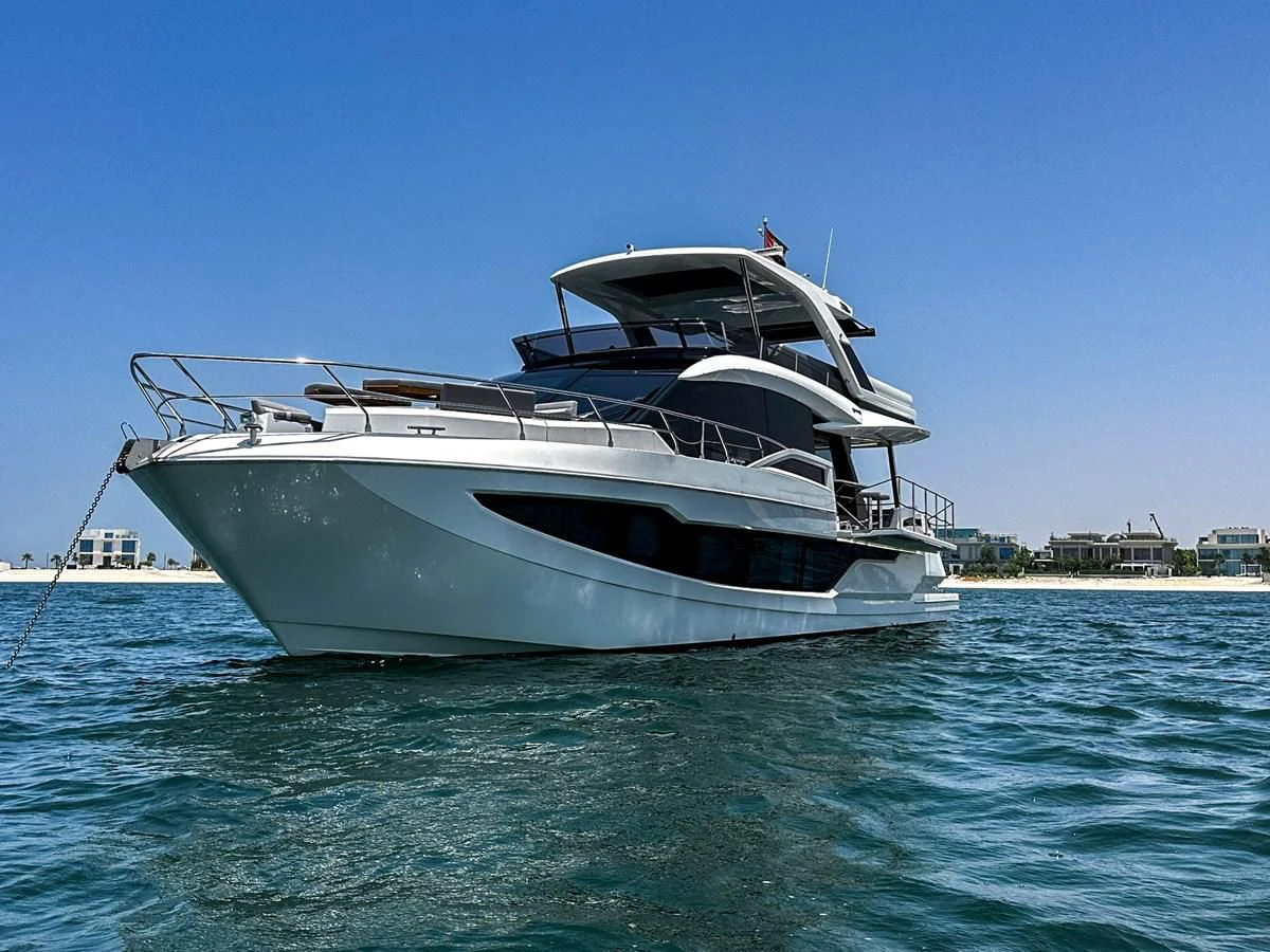 a white yacht on the water aboard JANICE Yacht for Sale