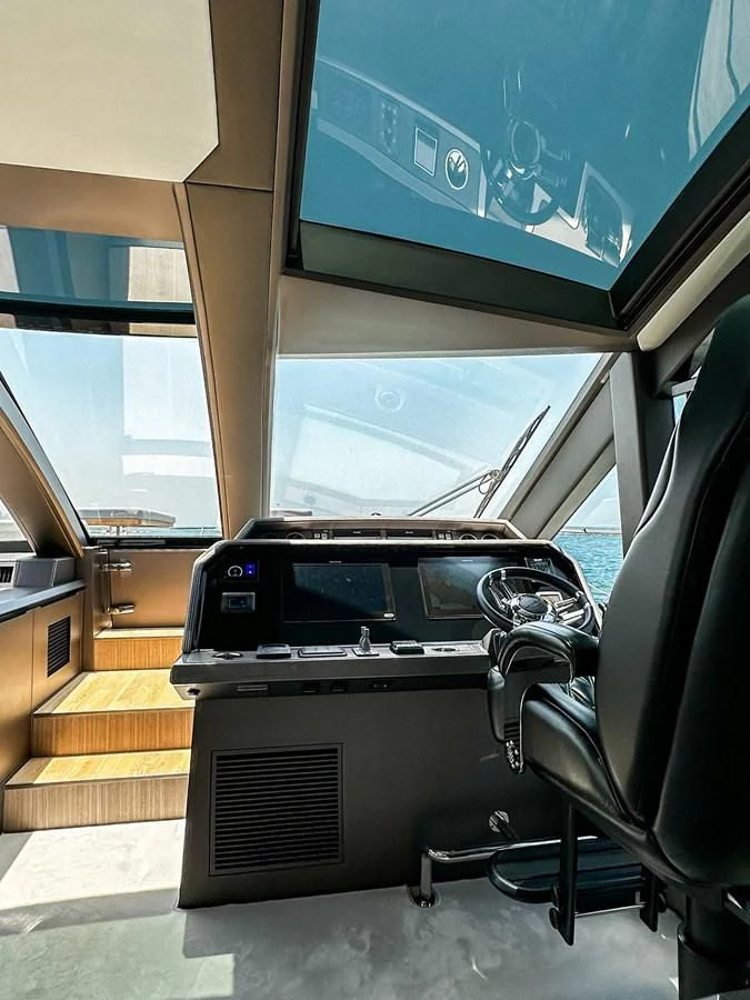 a car with a screen on the side aboard JANICE Yacht for Sale