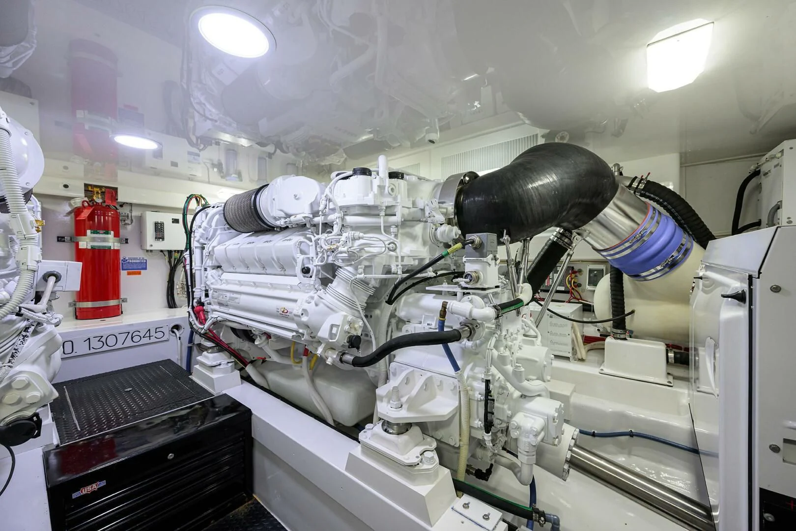 a machine with a large metal pipe aboard TEAM MAYHEM Yacht for Sale