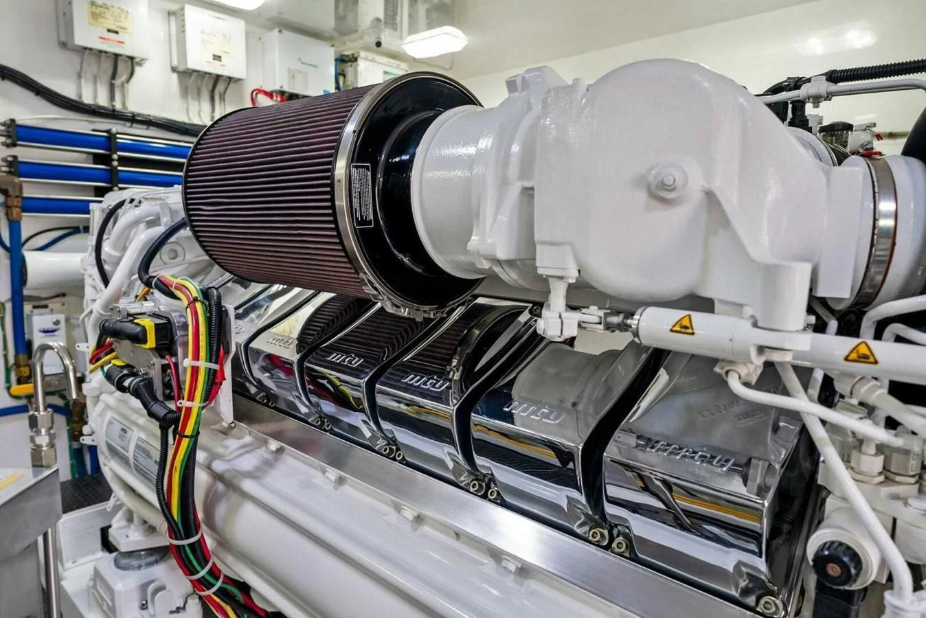 a machine with a large metal cylinder aboard TEAM MAYHEM Yacht for Sale