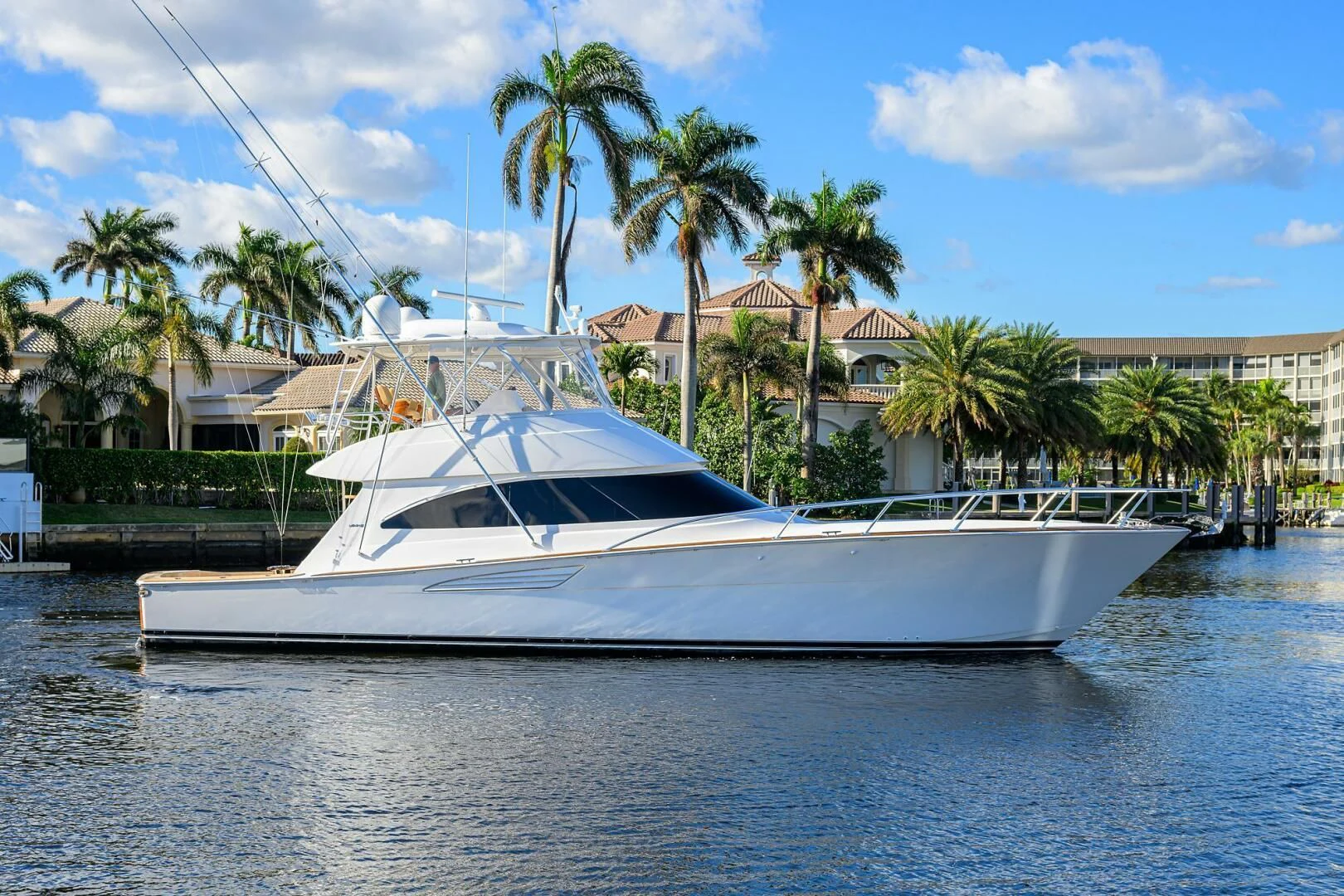 a white boat on water aboard TEAM MAYHEM Yacht for Sale