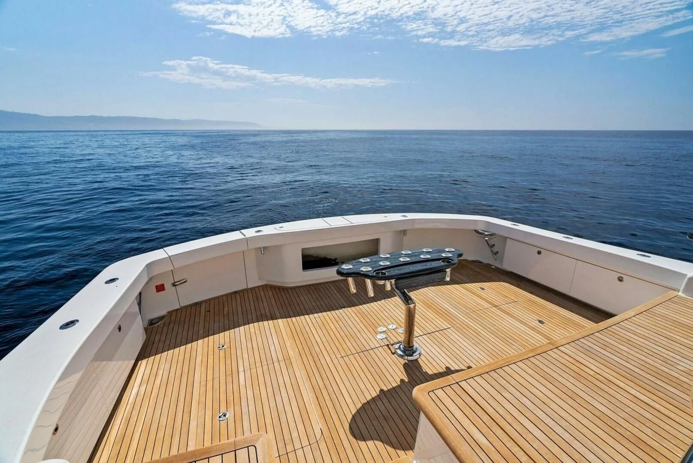 a deck overlooking the ocean aboard TEAM MAYHEM Yacht for Sale