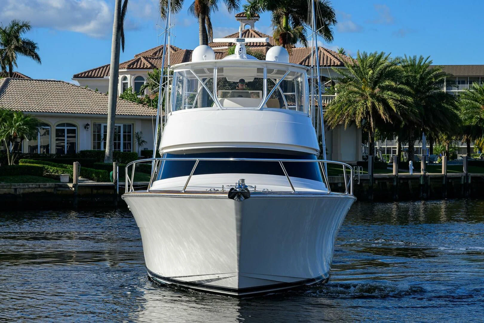 a white boat in the water aboard TEAM MAYHEM Yacht for Sale