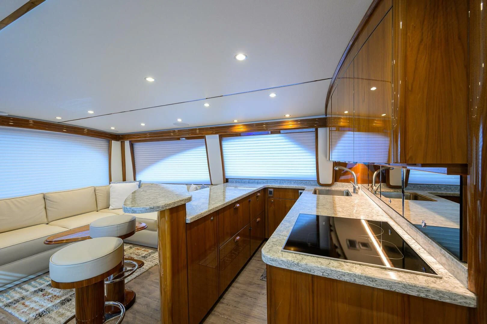 a kitchen with a large island aboard TEAM MAYHEM Yacht for Sale
