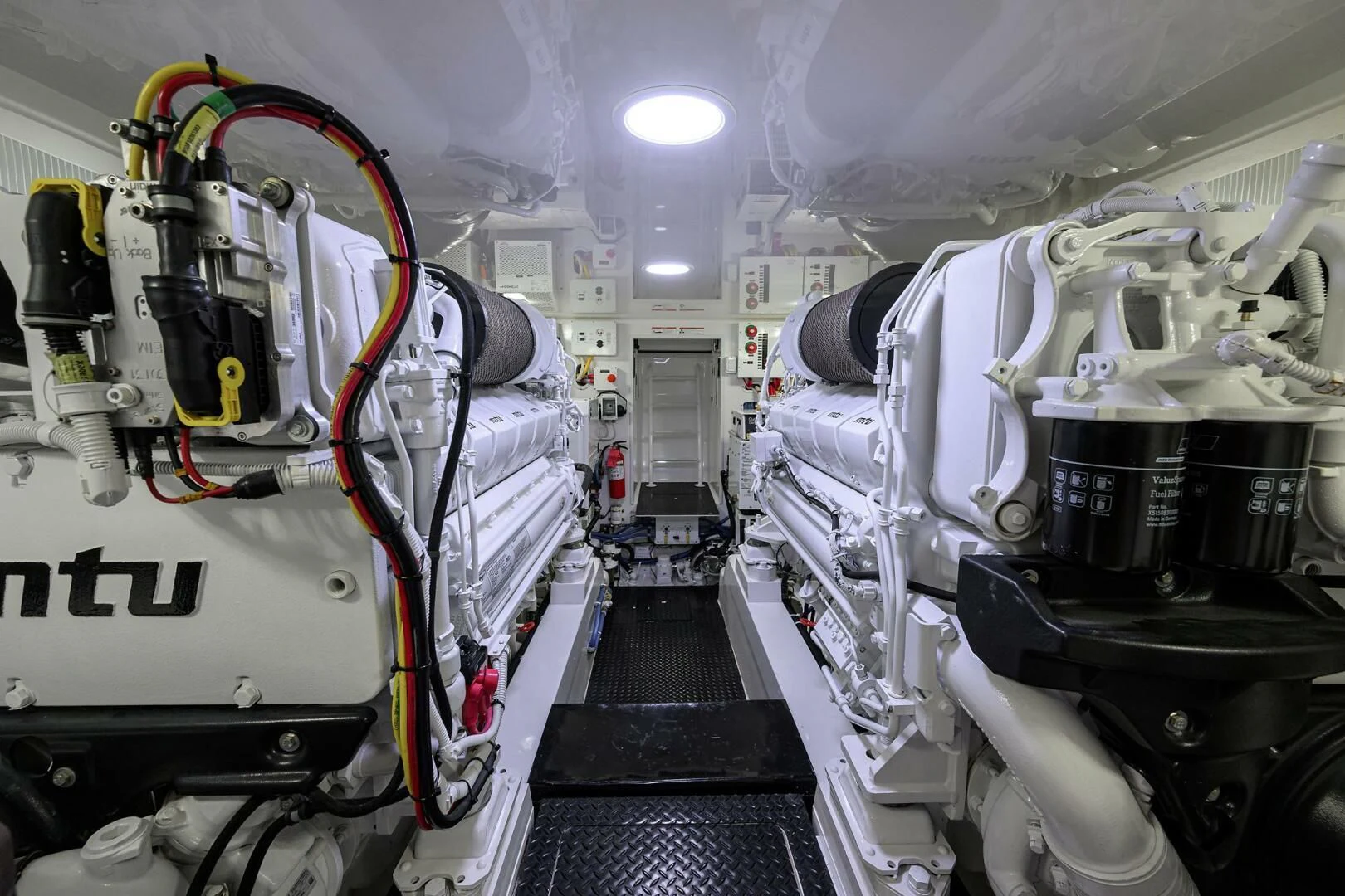 a room with large machines aboard TEAM MAYHEM Yacht for Sale