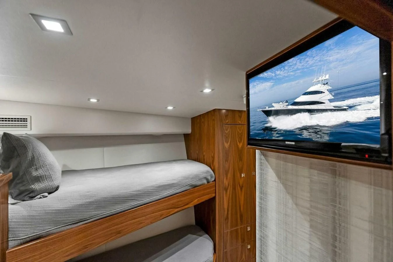 a tv on a wall aboard TEAM MAYHEM Yacht for Sale