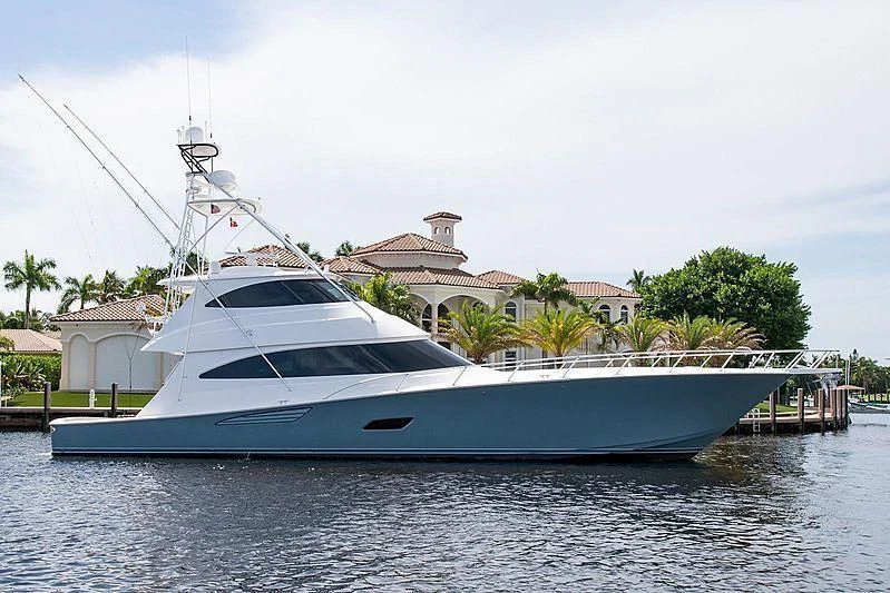 a white yacht docked aboard TEAM MAYHEM Yacht for Sale