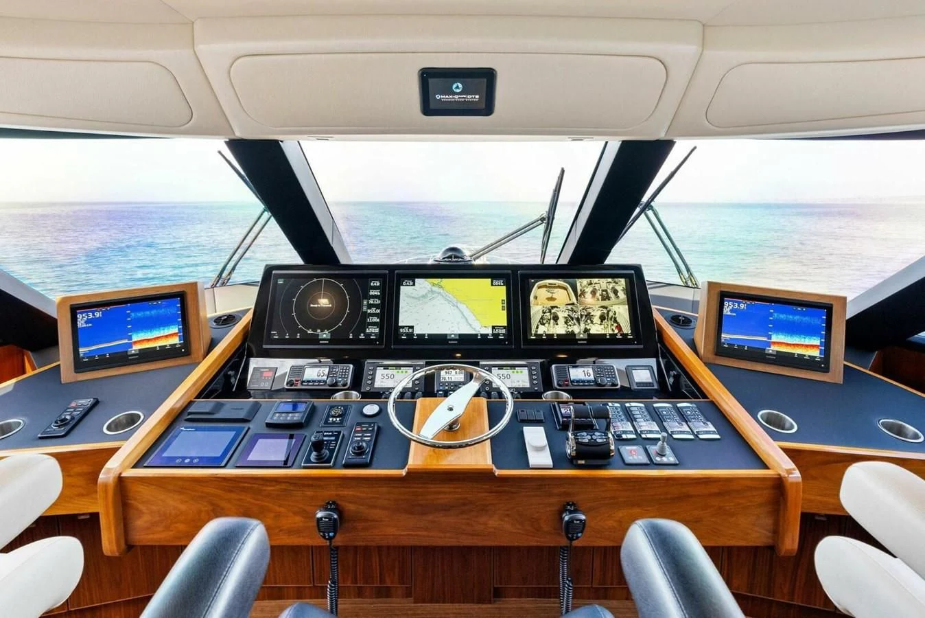 a control room with computers aboard TEAM MAYHEM Yacht for Sale