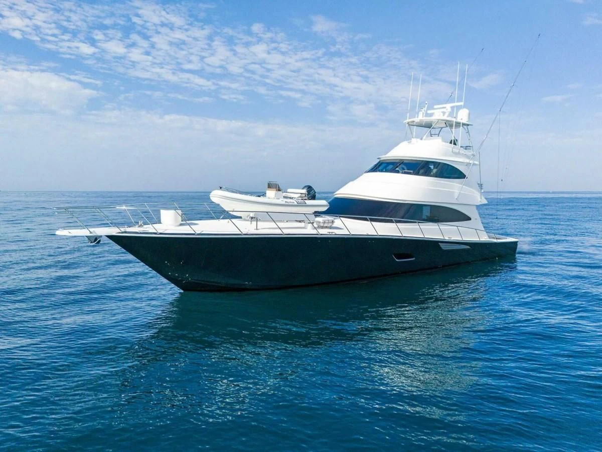 a white yacht in the water aboard TEAM MAYHEM Yacht for Sale