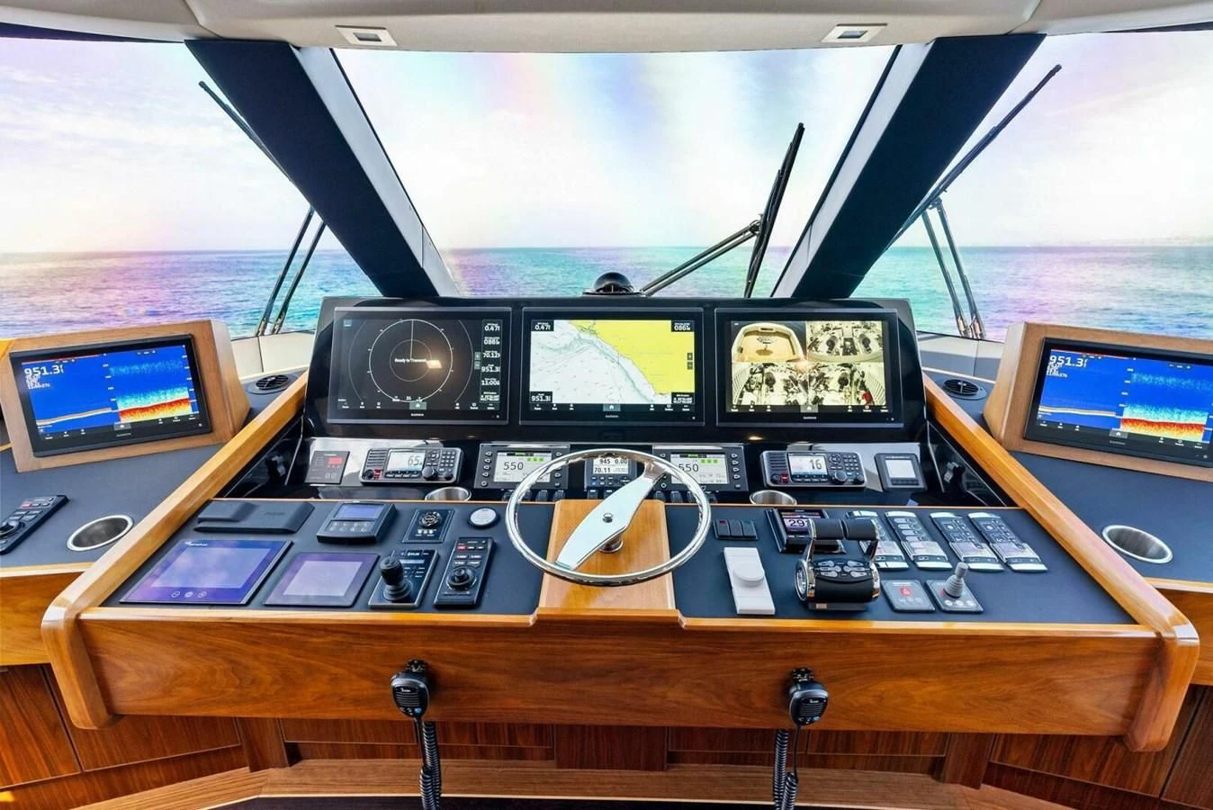 a control panel with many monitors aboard TEAM MAYHEM Yacht for Sale