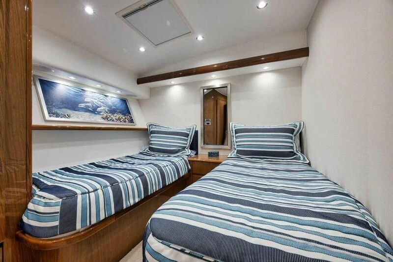 a couple of beds in a room aboard DOC Z Yacht for Sale