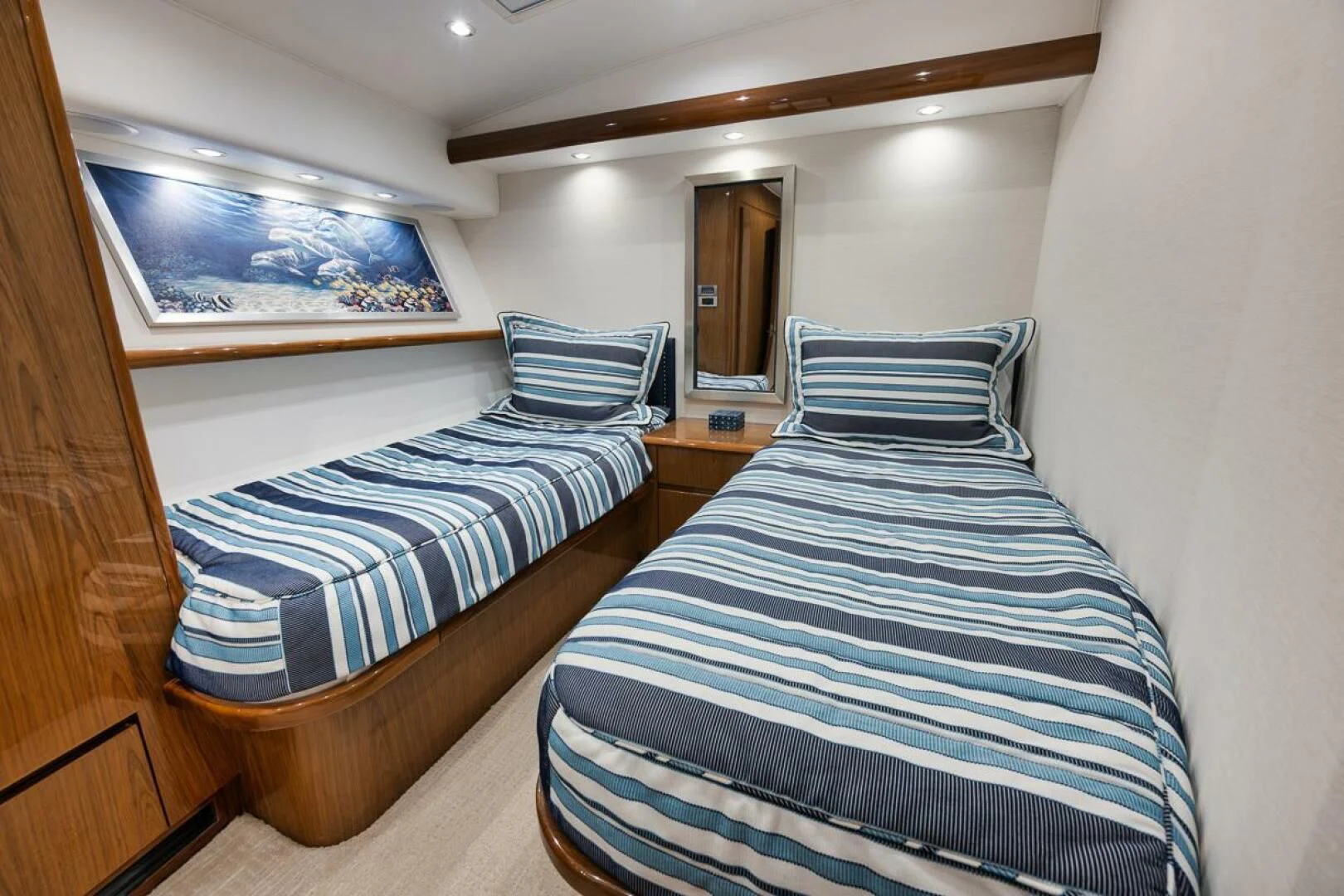 a couple of beds in a room aboard DOC Z Yacht for Sale