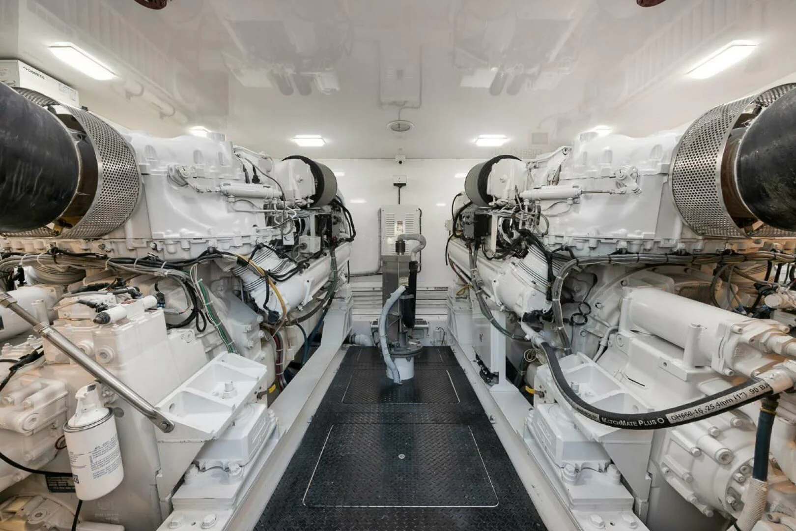 a room with several large pipes aboard DOC Z Yacht for Sale