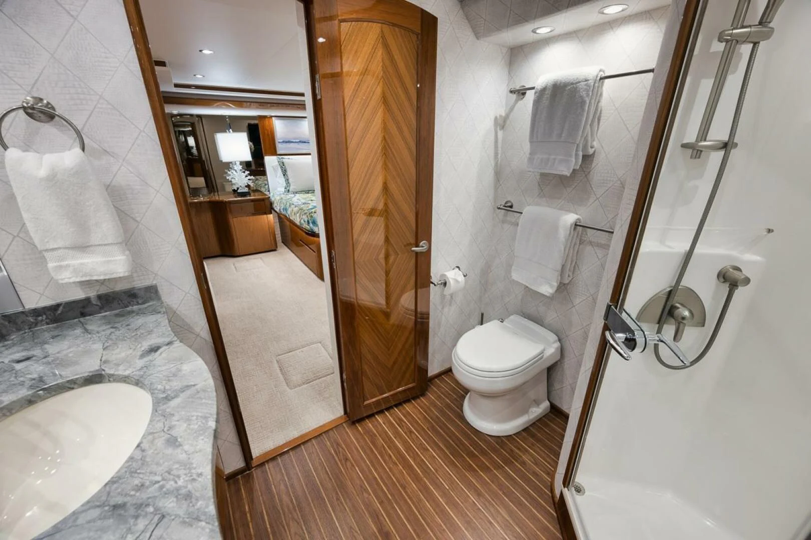 a bathroom with a shower and toilet aboard DOC Z Yacht for Sale