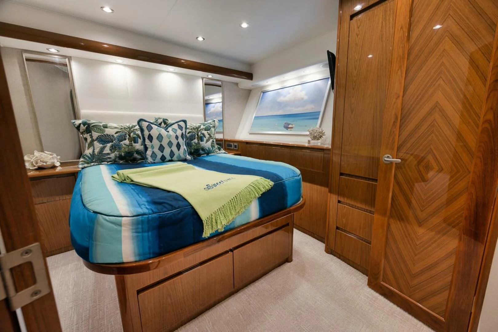 a bedroom with a bed aboard DOC Z Yacht for Sale