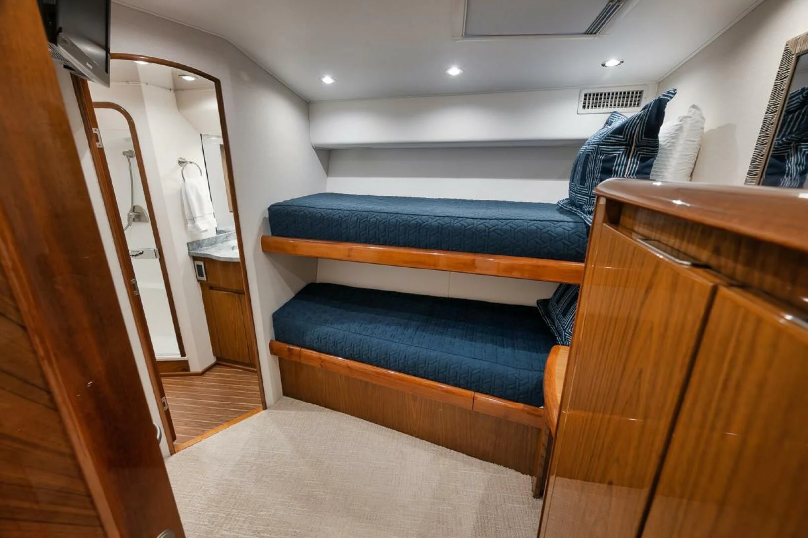 a bed in a room aboard DOC Z Yacht for Sale