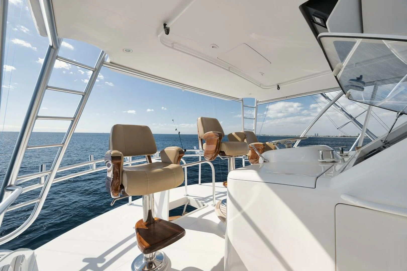 a boat with a chair on the front aboard DOC Z Yacht for Sale