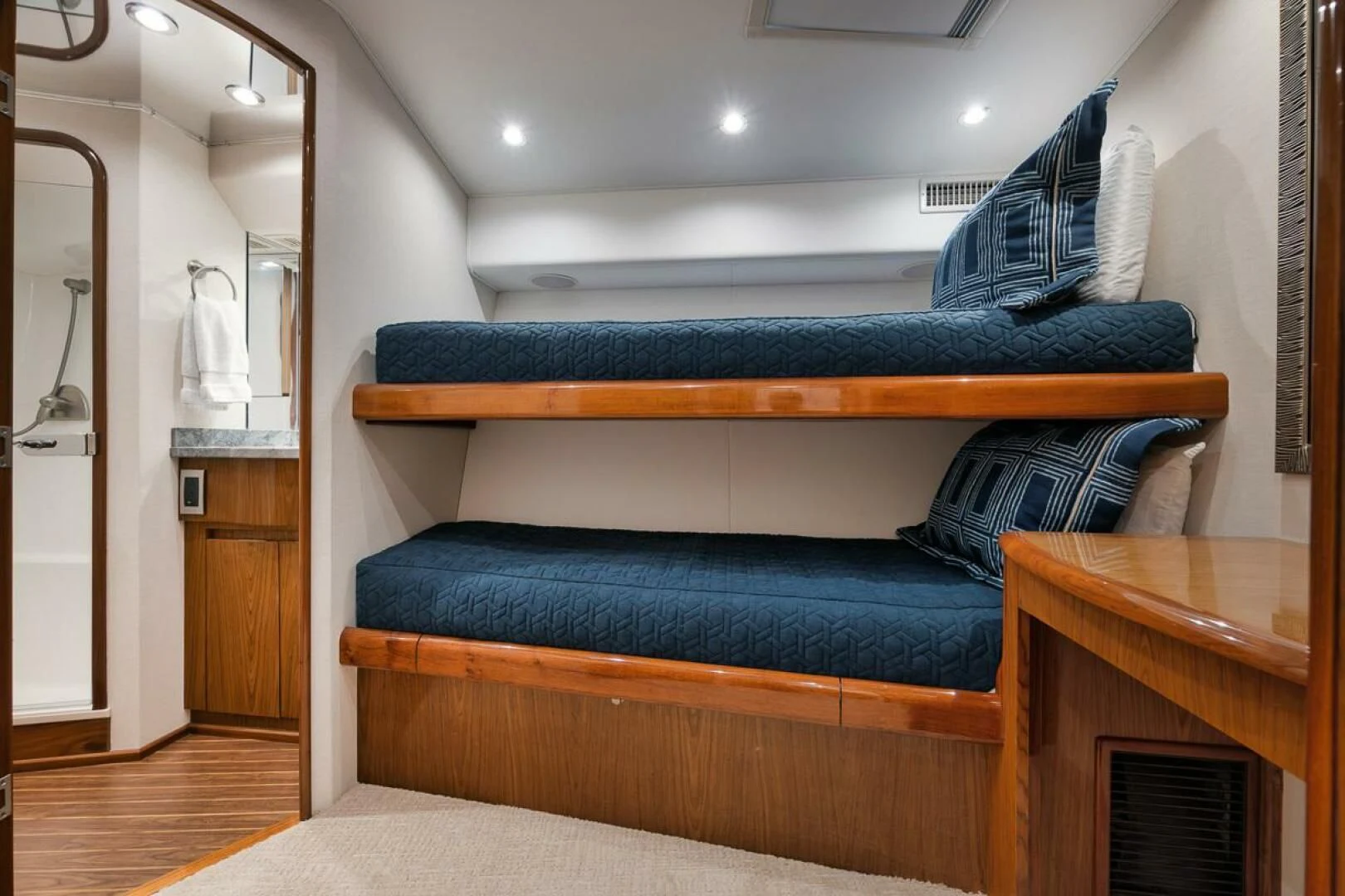 a couch with a blue pillow aboard DOC Z Yacht for Sale