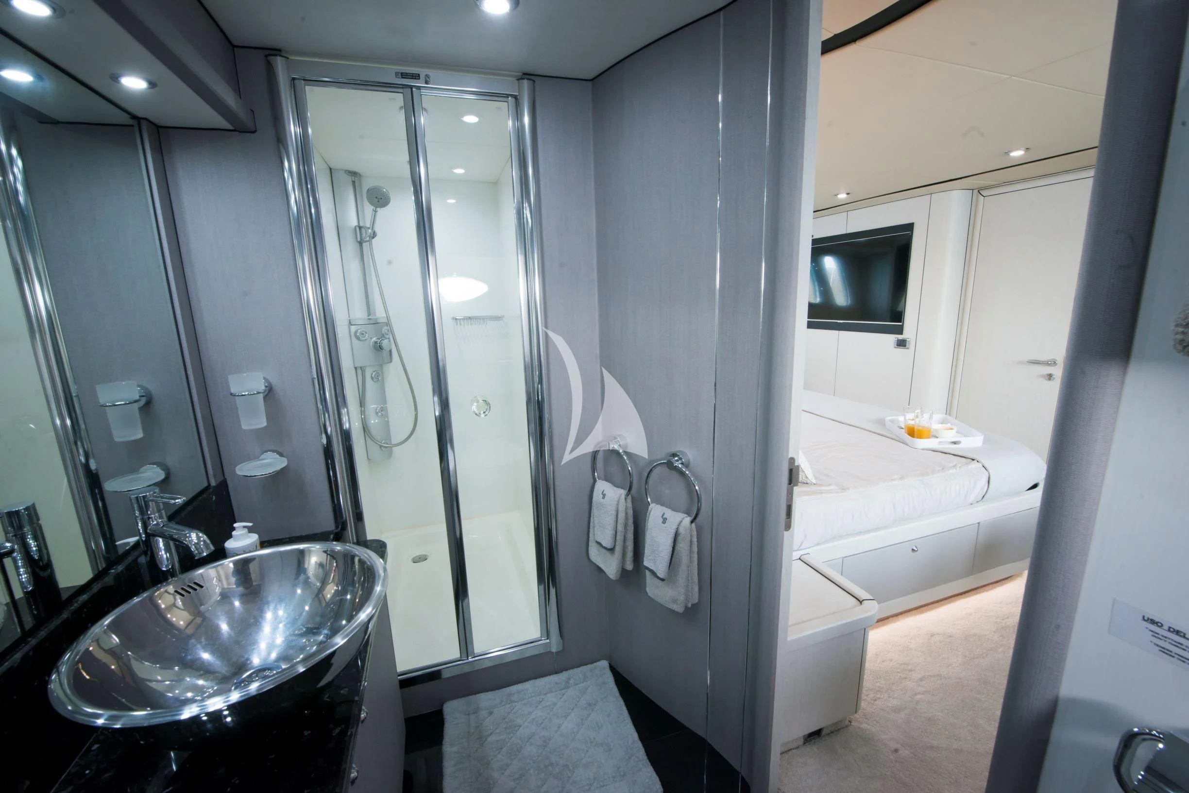 a bathroom with a glass shower aboard LIGHT BLUE Yacht for Sale
