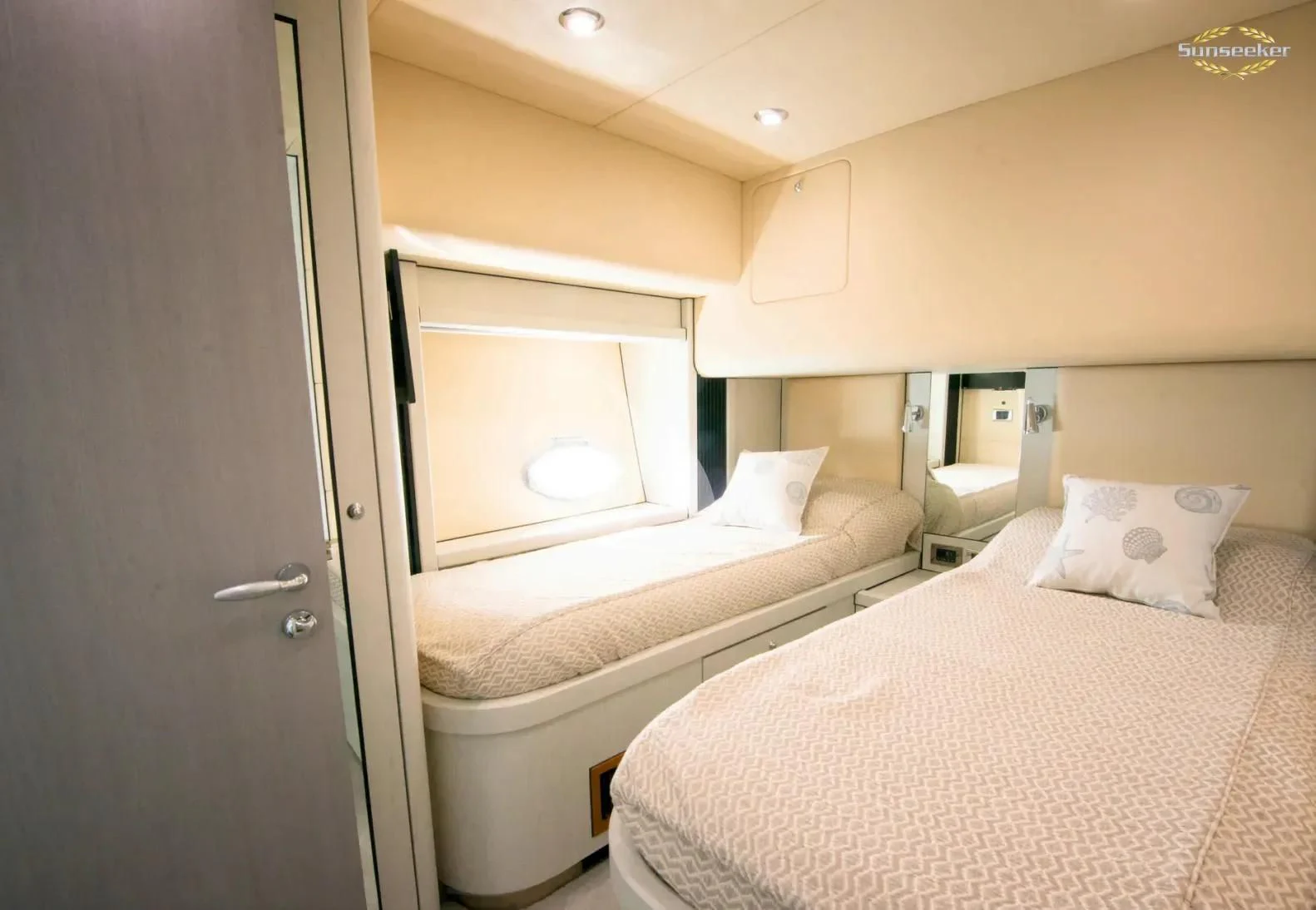 a room with two beds aboard LIGHT BLUE Yacht for Sale
