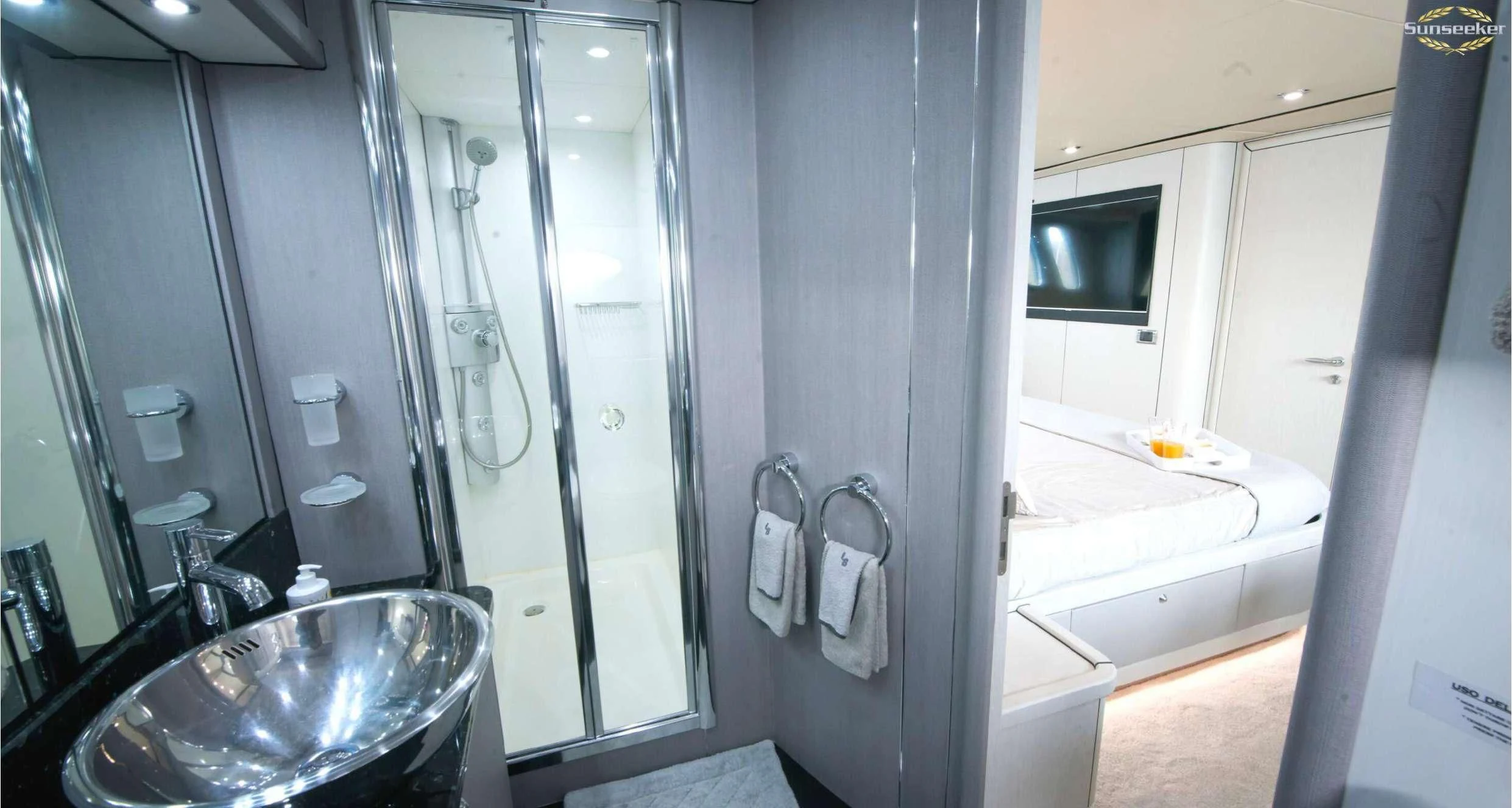 a bathroom with a glass shower aboard LIGHT BLUE Yacht for Sale