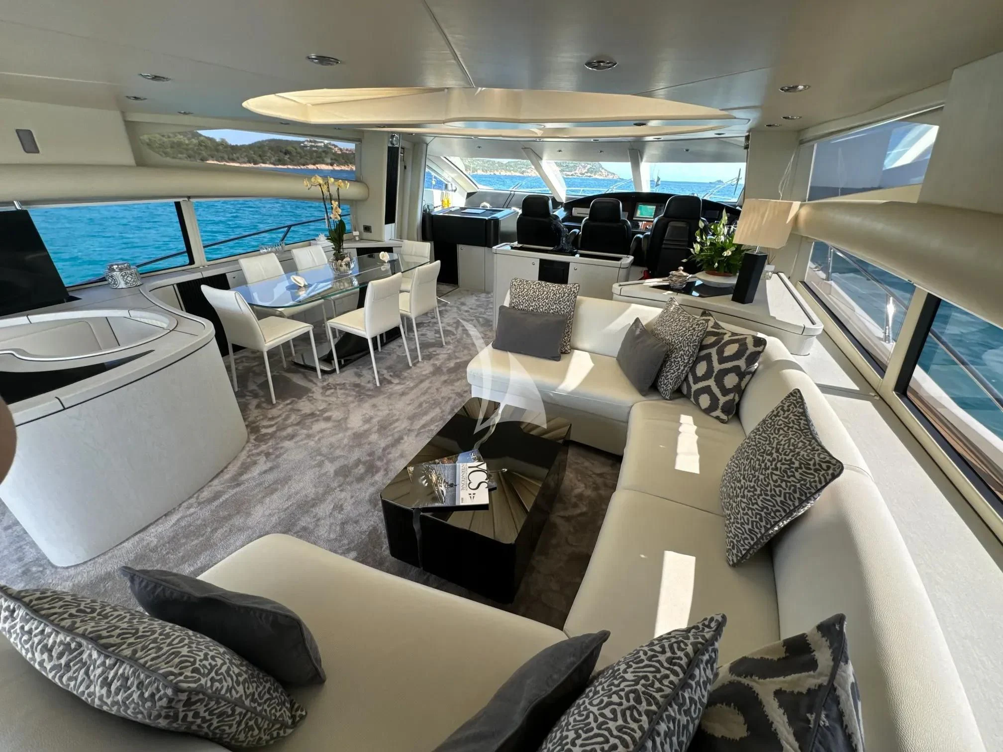 a living room with a large window aboard LIGHT BLUE Yacht for Sale