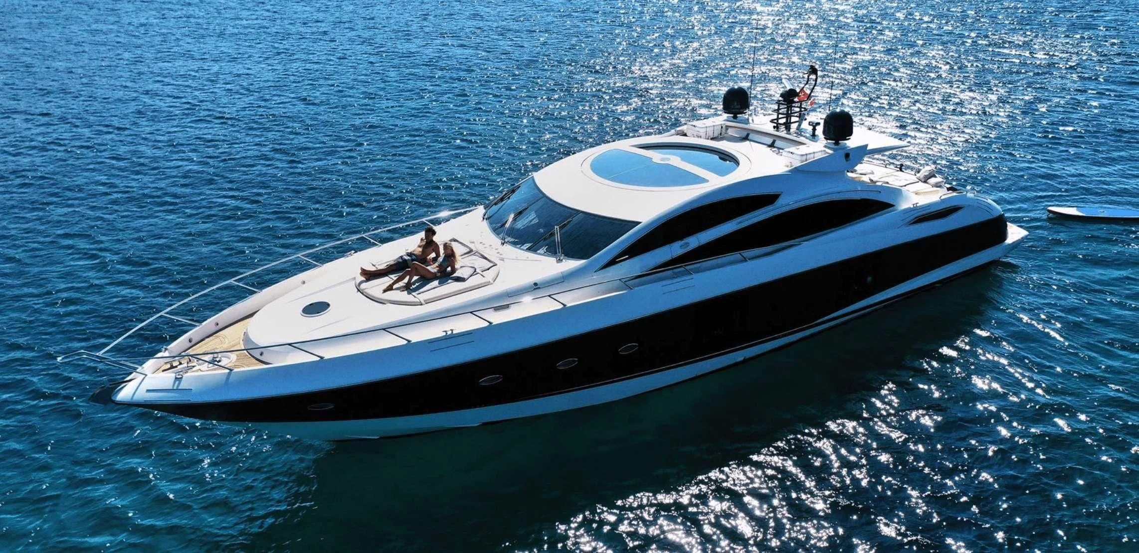 a white boat in the water aboard LIGHT BLUE Yacht for Sale