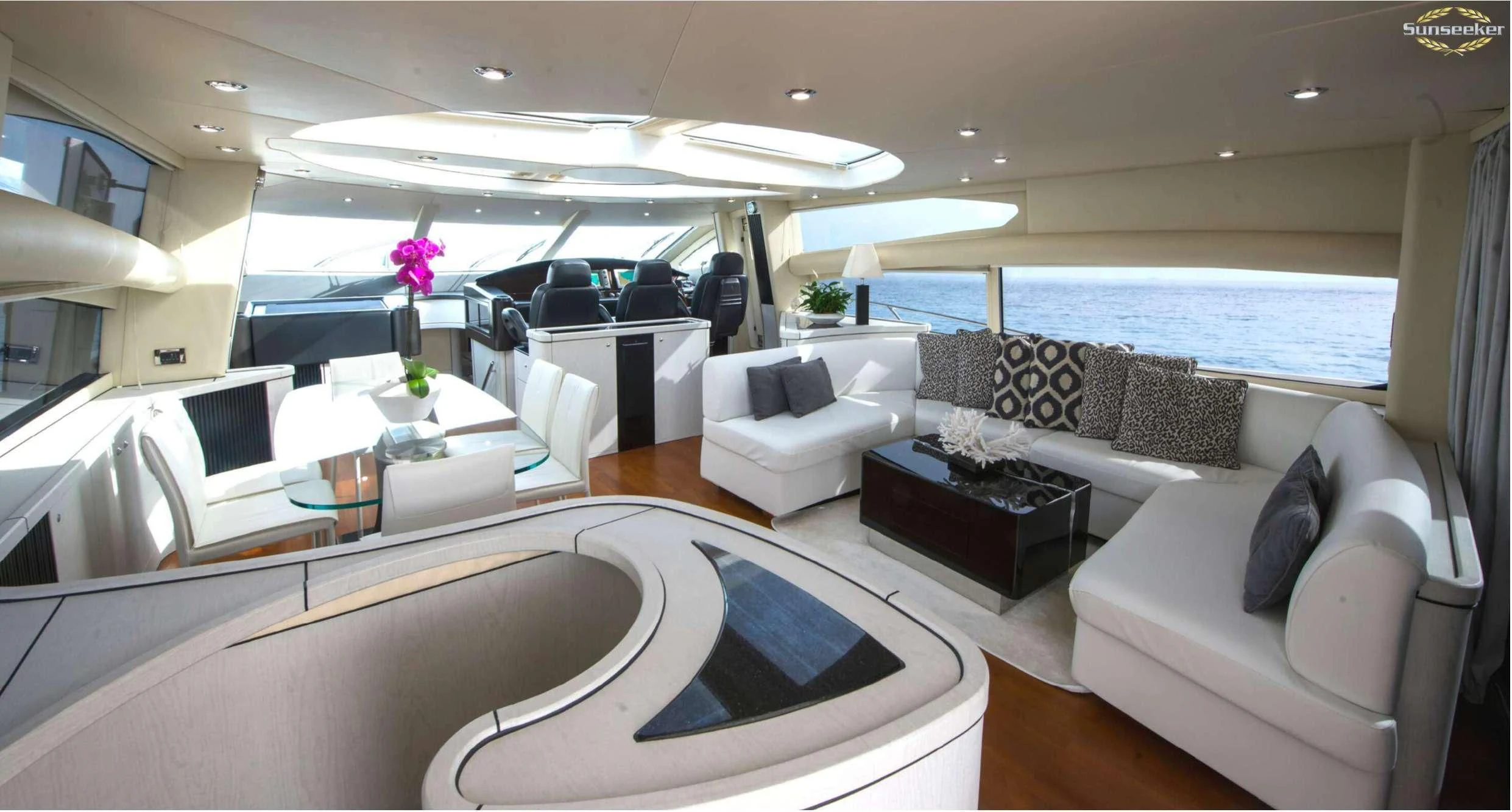 a large living room with a large swimming pool aboard LIGHT BLUE Yacht for Sale