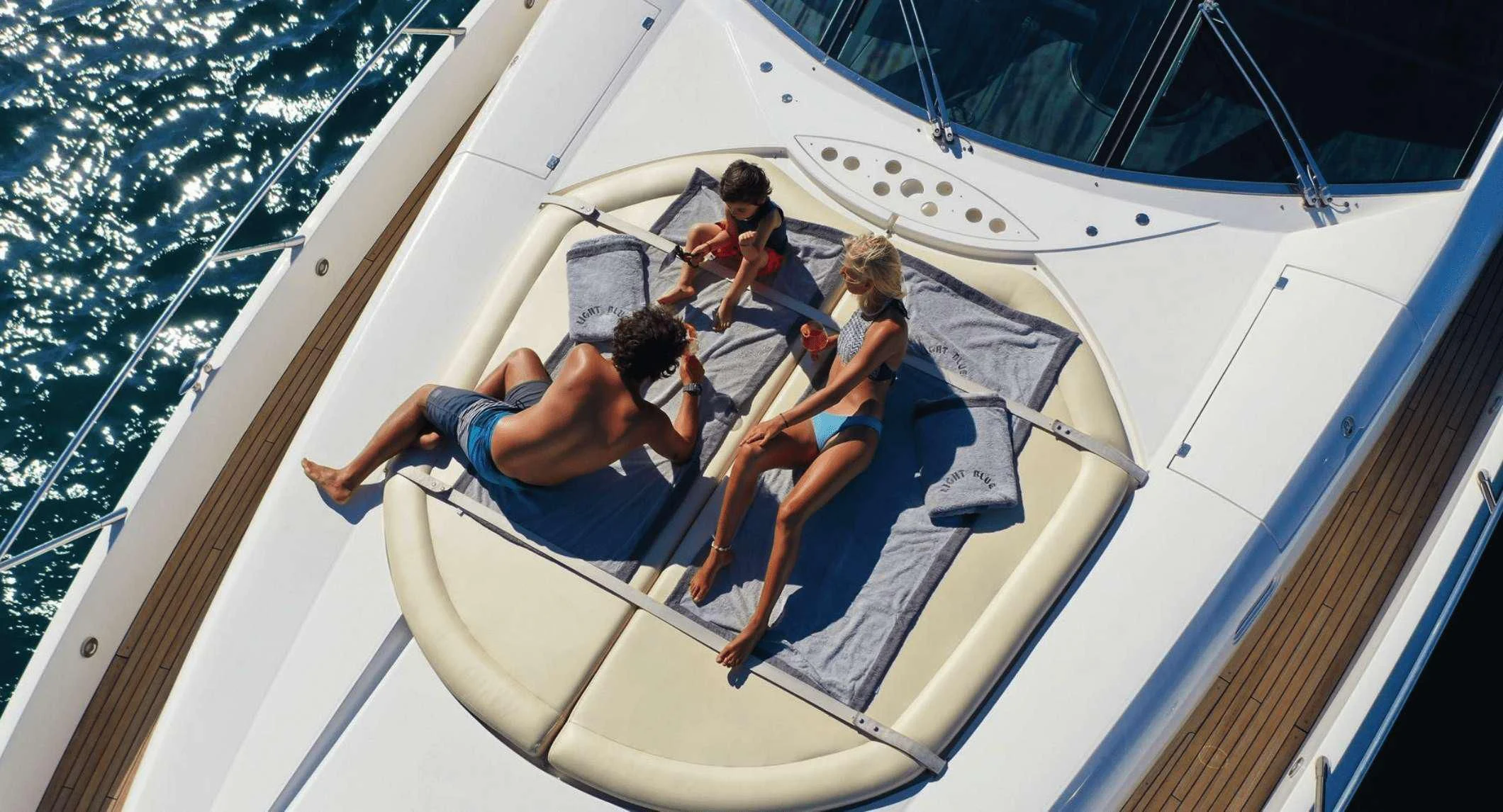 a group of people on a boat aboard LIGHT BLUE Yacht for Sale