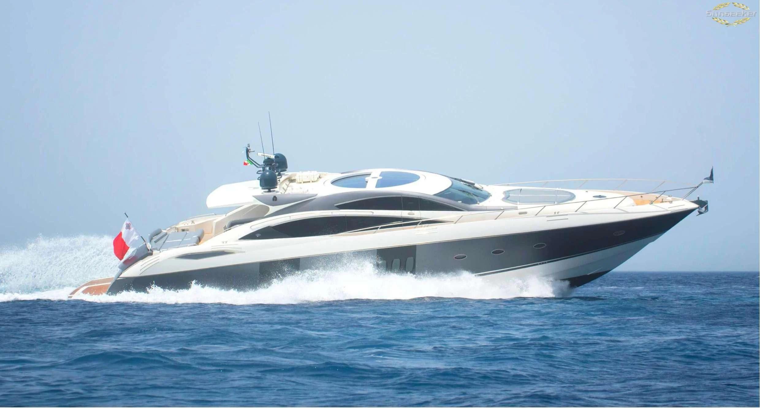 a white yacht in the water aboard LIGHT BLUE Yacht for Sale